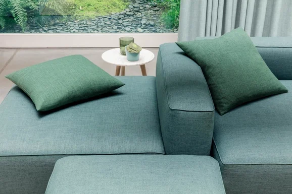 Photo of the fabric Frisco Spice in situ by James Dunlop Essentials. Use for Curtains, Upholstery, Accessory, Top of Bed. Style of Plain, Texture