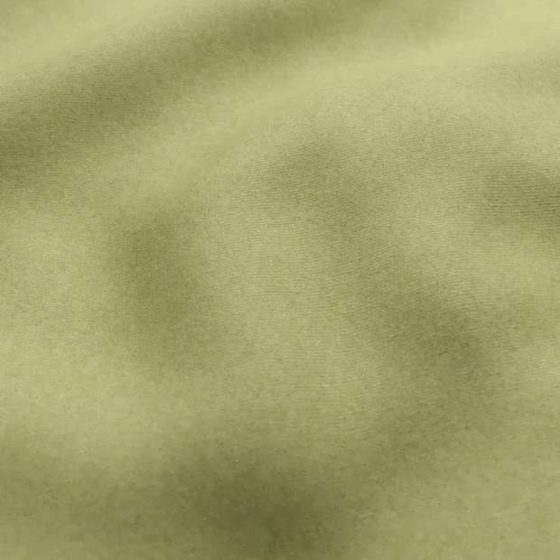 Photo of the fabric Braveheart Pistachio swatch by James Dunlop FibreGuard. Use for Upholstery, Accessory, Top of Bed. Style of Plain, Taffeta