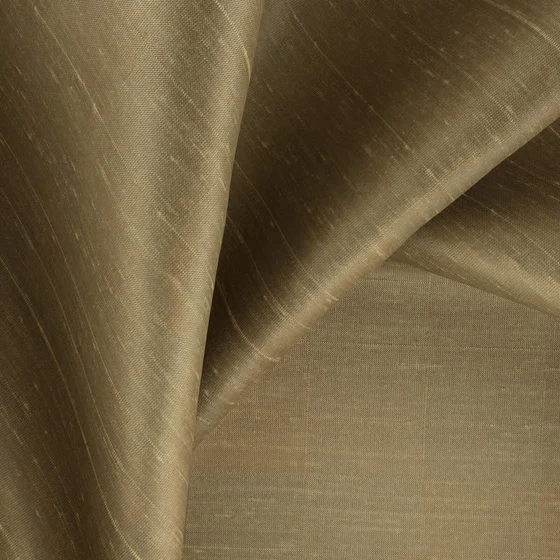 Photo of the fabric Silky Bronze swatch by Zepel. Use for Curtains, Accessory, Top of Bed. Style of Plain, Texture