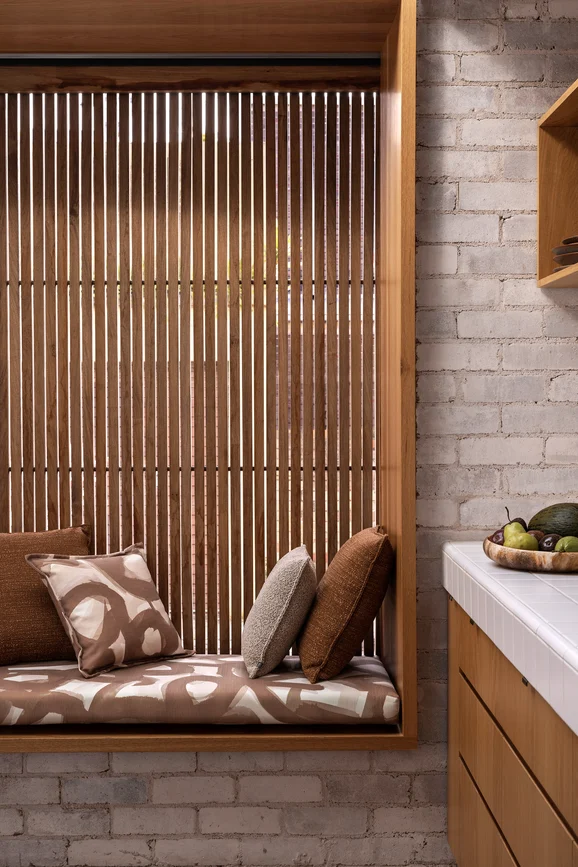 Photo of the fabric Abstraction Outdoor Brick in situ by Mokum. Use for Upholstery, Accessory. Style of Abstract, Print