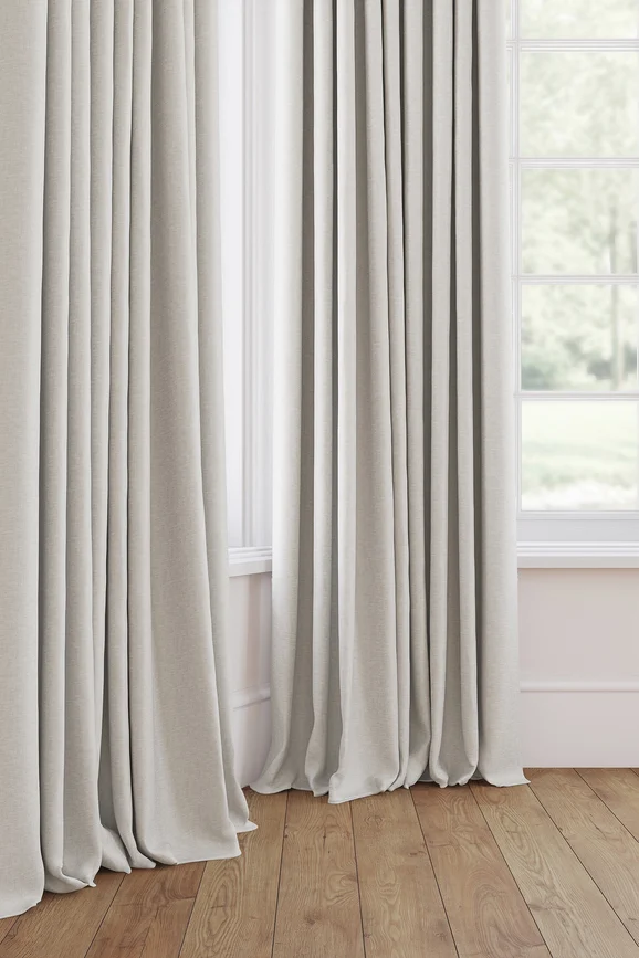Photo of the fabric Glamour Steel in situ by James Dunlop. Use for Curtains, Accessory. Style of Plain, Taffeta