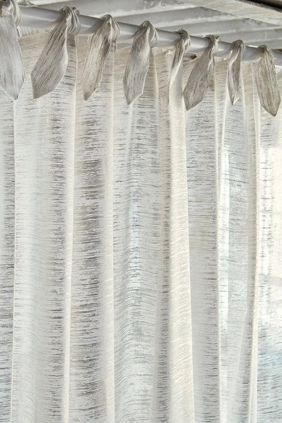 Photo of the fabric Clara V3355 02 in situ by Villa Nova. Use for Sheer Curtains. Style of Abstract, Sheer