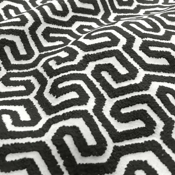 Photo of the fabric Comdeca Liquorice swatch by Zepel. Use for Curtains, Upholstery, Accessory. Style of Embroidery, Geometric