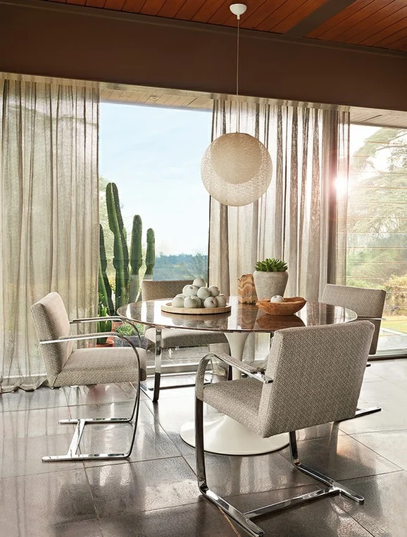 Photo of the fabric Sol Z501 02 in situ by Zinc. Use for Curtains, Upholstery, Accessory. Style of Plain, Texture