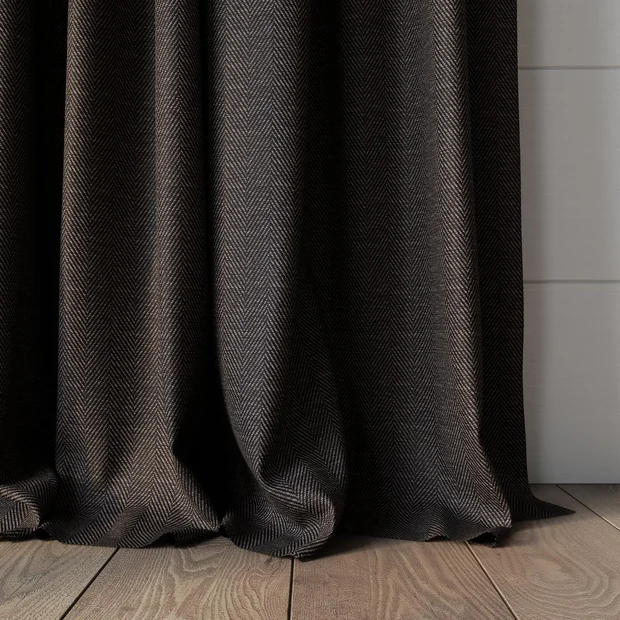 Photo of the fabric Trailblazer Onyx swatch by James Dunlop FibreGuard. Use for Curtains, Upholstery, Accessory, Top of Bed. Style of Texture, Traditional