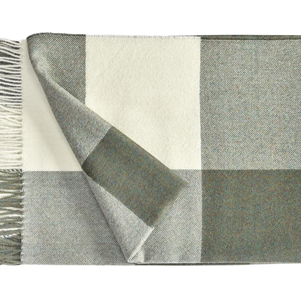 Photo of the fabric Throw-Carre 604 White/Green swatch by Fischbacher 1819. Use for Throw