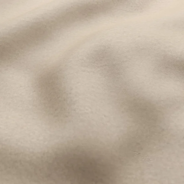 Photo of the fabric Tanning Stucco swatch by Zepel. Use for Upholstery, Accessory, Top of Bed. Style of Leather And Vinyl, Plain