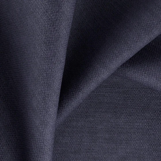 Photo of the fabric Colourwash Navy swatch by Zepel FibreGuard. Use for Curtains, Upholstery, Accessory, Top of Bed. Style of Plain, Texture