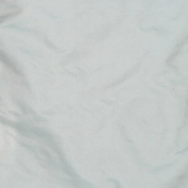 Photo of the fabric Taffy Ceramic swatch by James Dunlop Essentials. Use for Curtains, Upholstery Light Duty, Accessory, Top of Bed. Style of Plain, Taffeta