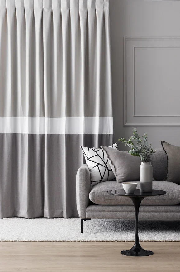 Photo of the fabric Stallion 2 Blackout Ash in situ by James Dunlop Essentials. Use for Curtains. Style of Plain, Texture