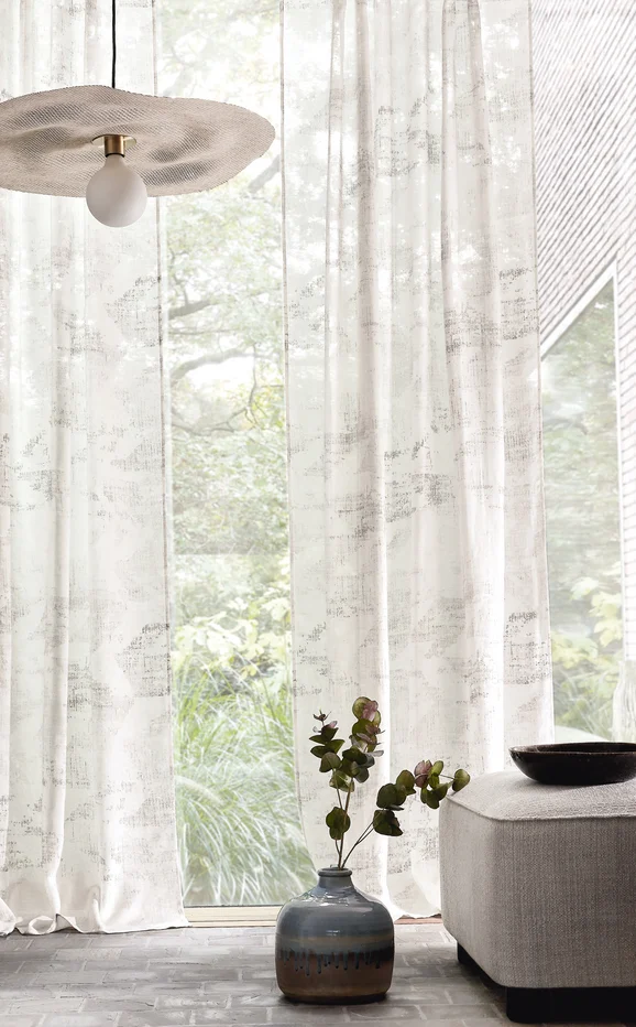 Photo of the fabric Ulota 5044 5044 0236 in situ by Casamance. Use for Sheer Curtains. Style of Sheer