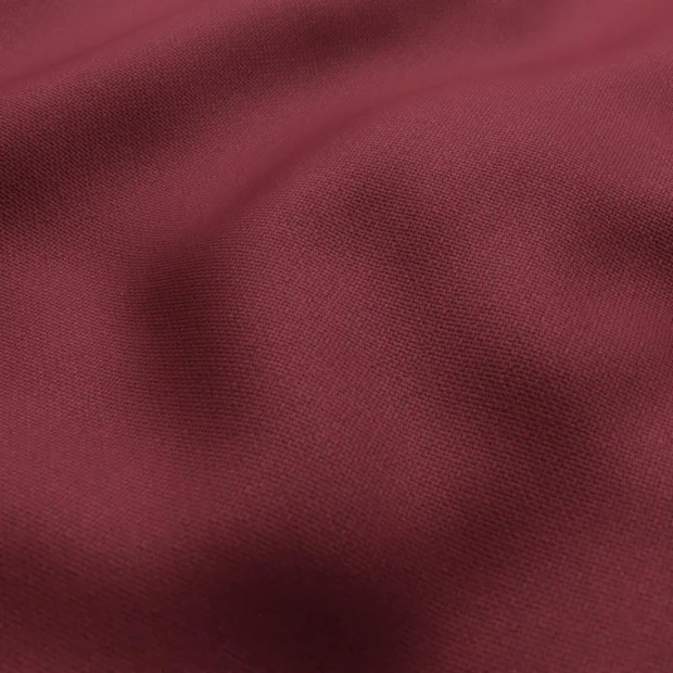 Photo of the fabric Como Bordeaux swatch by Mokum. Use for Upholstery, Accessory. Style of Plain, Texture