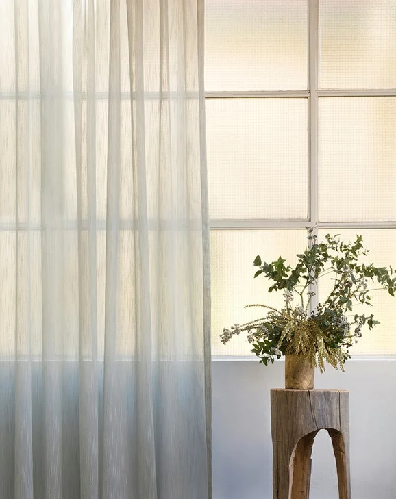 Photo of the fabric Tranquility Zinc in situ by Mokum. Use for Sheer Curtains. Style of Plain, Sheer
