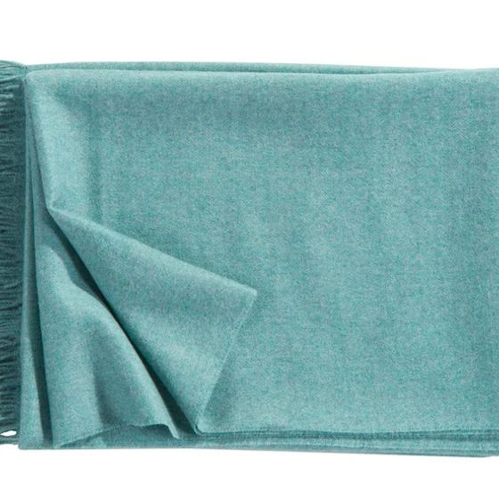 Photo of the fabric Puro Throw 130Cm X 200Cm 1005A 519 Aquamarine swatch by Fischbacher 1819. Use for Throw