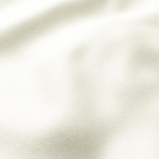 Photo of the fabric Iridium Ivory swatch by Zepel. Use for Curtains, Upholstery, Accessory, Top of Bed. Style of Plain, Velvet