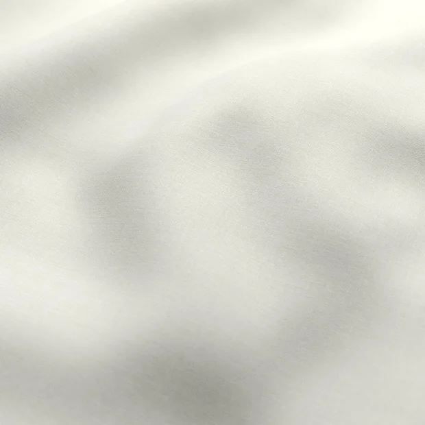 Photo of the fabric Kidglove Papyrus swatch by Zepel FibreGuard. Use for Curtains, Upholstery, Accessory, Top of Bed. Style of Plain, Taffeta