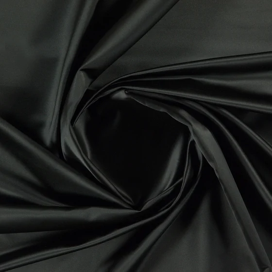 Photo of the fabric Sateen 137 Onyx swatch by Zepel. Use for Curtains, Upholstery, Accessory, Top of Bed. Style of Plain, Taffeta