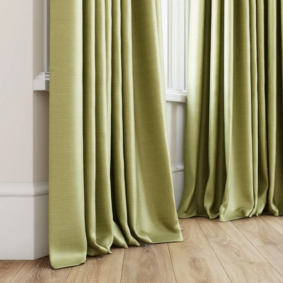Photo of the fabric Luxe Pistachio swatch by James Dunlop Essentials. Use for Curtains, Accessory, Top of Bed. Style of Plain, Texture
