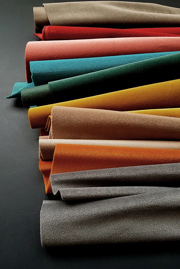 Photo of the fabric Minaude 4460 4460 3894 in situ by Casamance. Use for Curtains, Upholstery, Accessory. Style of Plain, Velvet