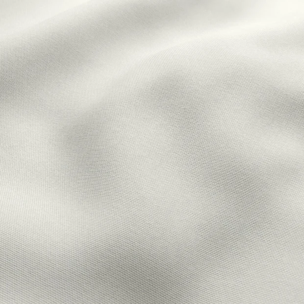 Photo of the fabric Sit Out Greige swatch by James Dunlop FibreGuard. Use for Upholstery, Accessory. Style of Plain, Taffeta