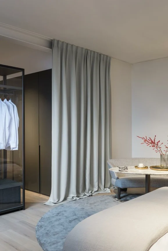 Photo of the fabric Antares Orchid in situ by Zepel. Use for Curtains, Accessory, Top of Bed. Style of Dim Out, Plain