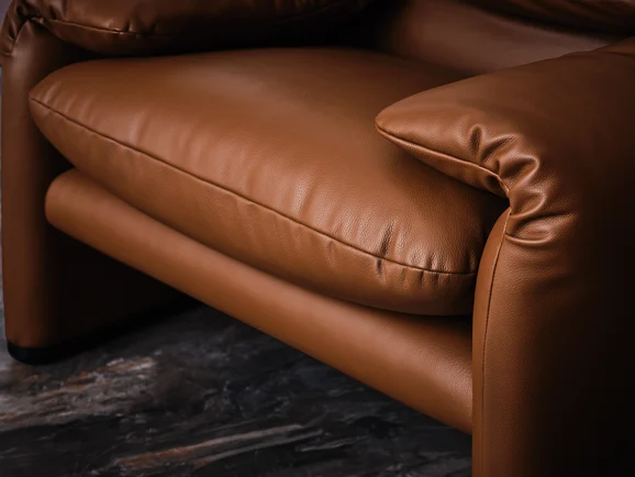 Photo of the fabric Marley Hide Zl102 03 in situ by Zinc. Use for Upholstery, Accessory. Style of Leather And Vinyl, Plain