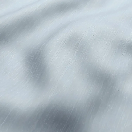 Photo of the fabric Luxe Sky swatch by James Dunlop Essentials. Use for Curtains, Accessory, Top of Bed. Style of Plain, Texture