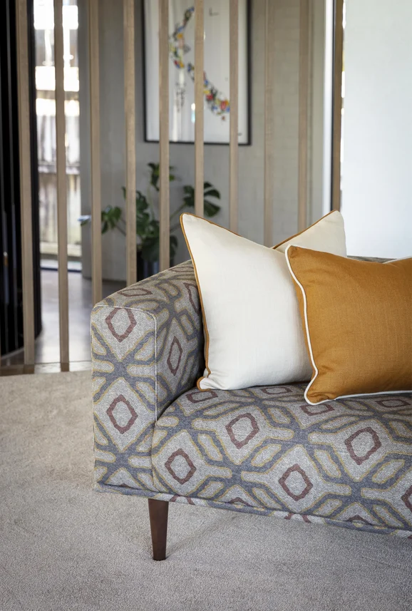 Photo of the fabric Enhance Ink in situ by James Dunlop. Use for Upholstery, Accessory. Style of Geometric, Print