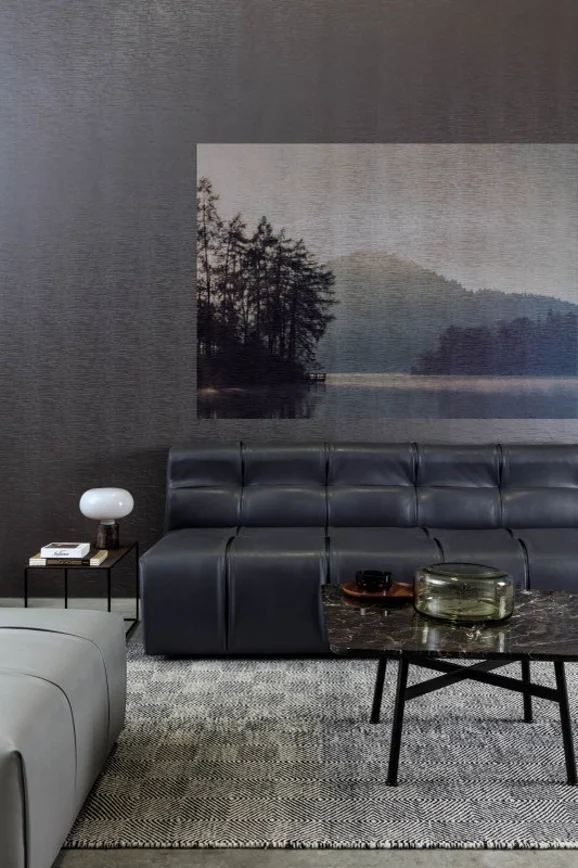 Photo of the fabric Technica Bronze in situ by Zepel. Use for Upholstery, Accessory, Top of Bed. Style of Leather And Vinyl, Plain