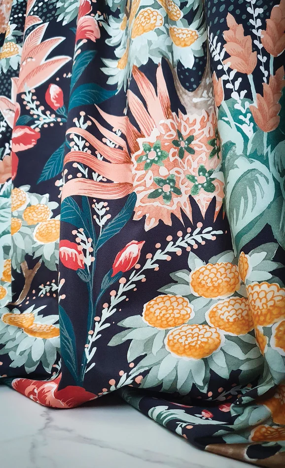 Photo of the fabric Cite Des Roses 4714 4714 0121 in situ by Casamance. Use for Curtains, Upholstery, Accessory. Style of Floral And Botannical