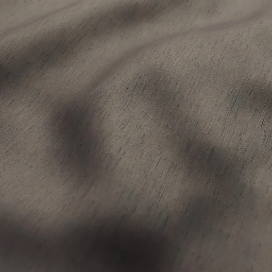 Photo of the fabric Silk Road Truffle swatch by James Dunlop Essentials. Use for Curtains, Accessory. Style of Plain, Texture