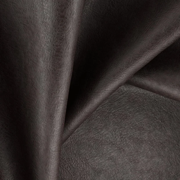 Photo of the fabric Tanning Brownie swatch by Zepel. Use for Upholstery, Accessory, Top of Bed. Style of Leather And Vinyl, Plain