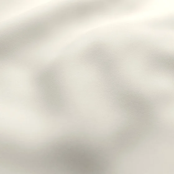 Photo of the fabric Woolskin Marzipan swatch by Zepel FibreGuard. Use for Curtains, Upholstery, Accessory, Top of Bed. Style of Plain, Taffeta