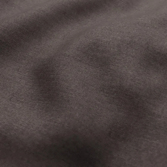 Photo of the fabric Cushy Chestnut swatch by Zepel. Use for Curtains, Upholstery, Accessory, Top of Bed. Style of Plain, Texture
