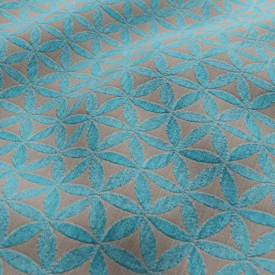 Photo of the fabric Tapa Aqua swatch by James Dunlop. Use for Upholstery, Accessory. Style of Geometric