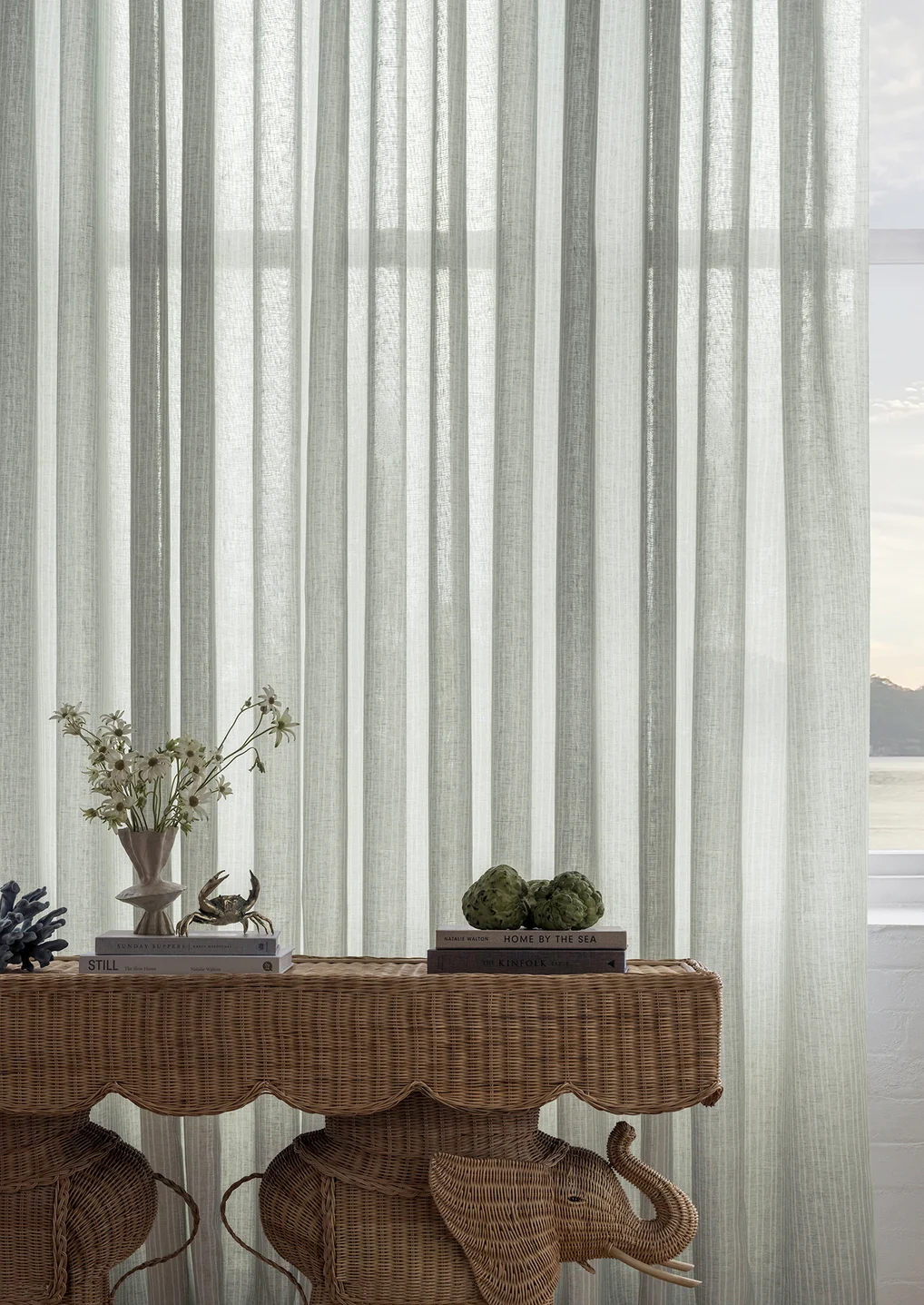 Coastal sheer curtains with Asiatic decor