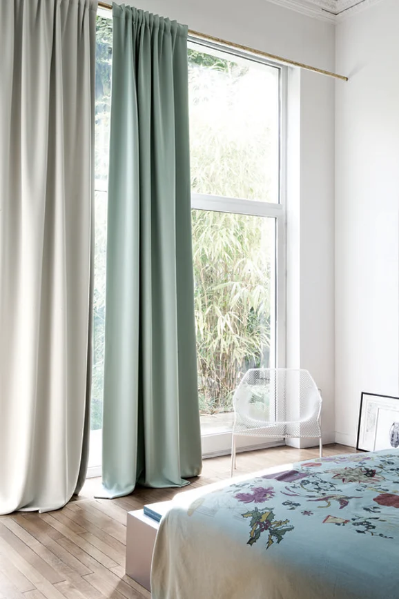Photo of the fabric Cinema Sunset in situ by Zepel. Use for Curtains, Accessory, Top of Bed. Style of Dim Out, Plain