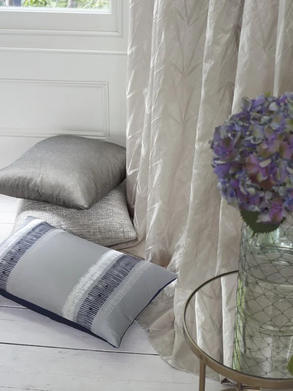 Photo of the fabric Kasian V3175 01 in situ by Villa Nova. Use for Curtains, Upholstery Light Duty, Accessory, Top of Bed. Style of Plain