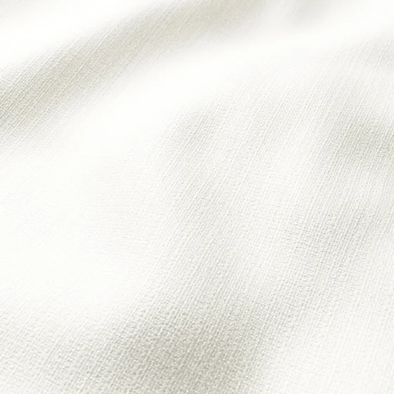 Photo of the fabric Saturn Cream swatch by Zepel. Use for Curtains, Upholstery, Accessory, Top of Bed. Style of Plain, Texture