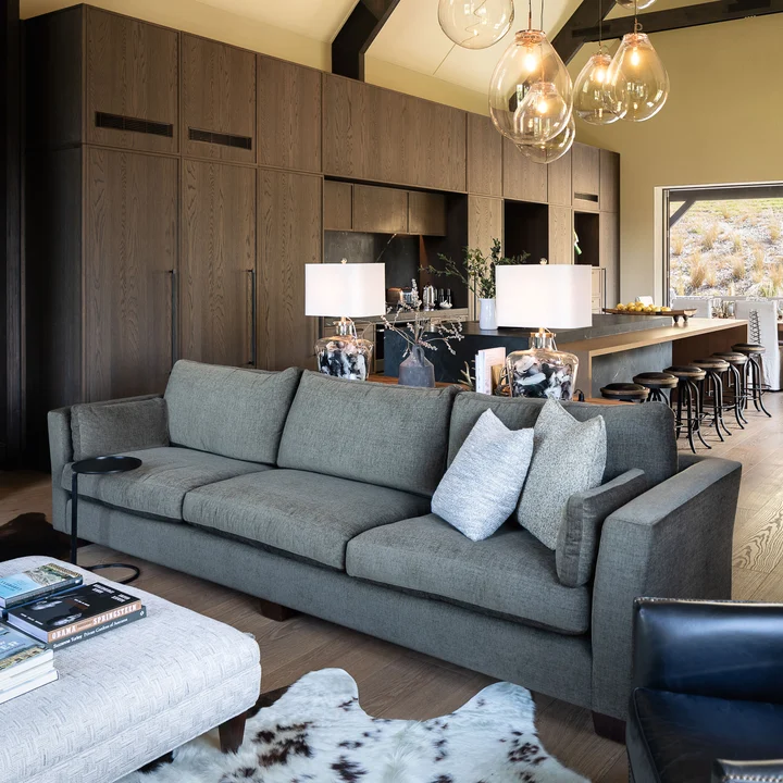 Couch in Tahiti colour Olive by Mokum FibreGuard, cushions in Staunch by James Dunlop FibreGuard | Image Michelle Weir