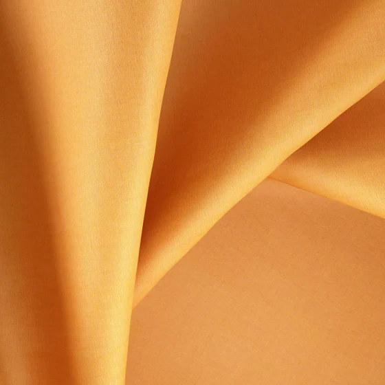 Photo of the fabric Catwalk Tangerine swatch by Zepel. Use for Curtains, Upholstery Light Duty, Accessory, Top of Bed. Style of Plain, Taffeta