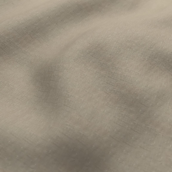Photo of the fabric Satori Stonewash Jute swatch by Mokum. Use for Curtains, Upholstery Light Duty, Accessory, Top of Bed. Style of Plain, Texture