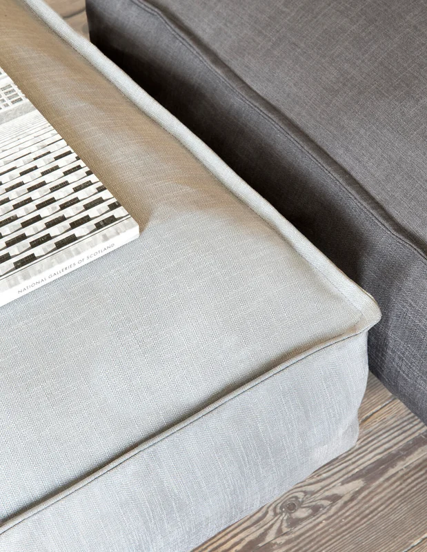Photo of the fabric Unlimited Silver in situ by Zepel. Use for Curtains, Upholstery, Accessory, Top of Bed. Style of Plain, Texture