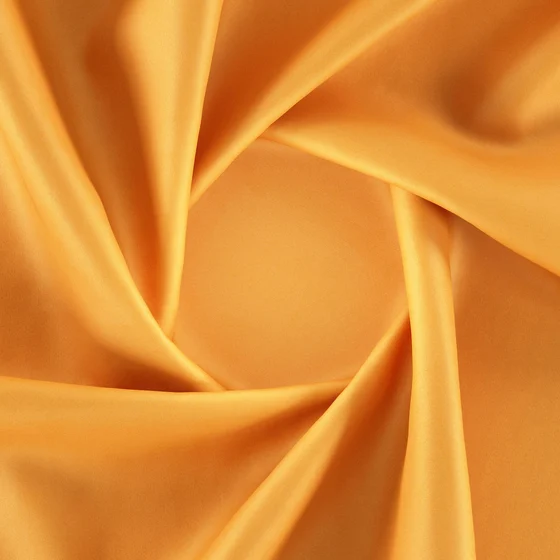 Photo of the fabric Catwalk Peach swatch by Zepel. Use for Curtains, Upholstery Light Duty, Accessory, Top of Bed. Style of Plain, Taffeta
