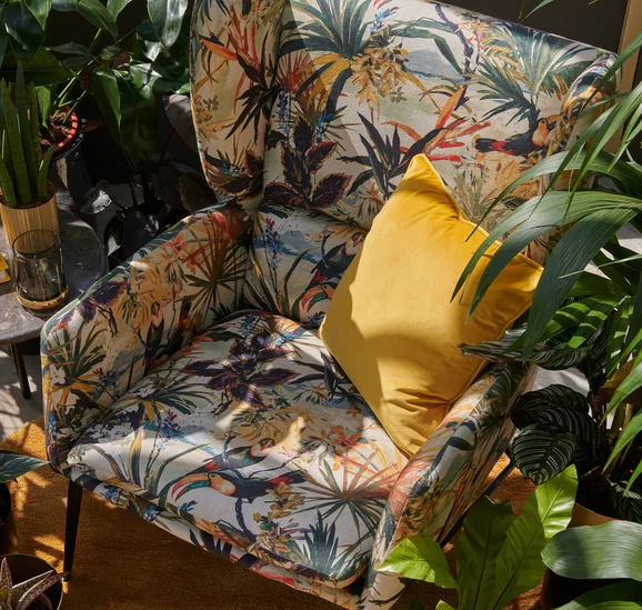 Photo of the fabric Toucan F1614 1 in situ by Clarke & Clarke. Use for Curtains, Upholstery, Accessory