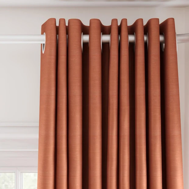 Photo of the fabric Luxe Coral swatch by James Dunlop Essentials. Use for Curtains, Accessory, Top of Bed. Style of Plain, Texture
