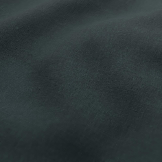 Photo of the fabric Satori Stonewash Petrol swatch by Mokum. Use for Curtains, Upholstery Light Duty, Accessory, Top of Bed. Style of Plain, Texture