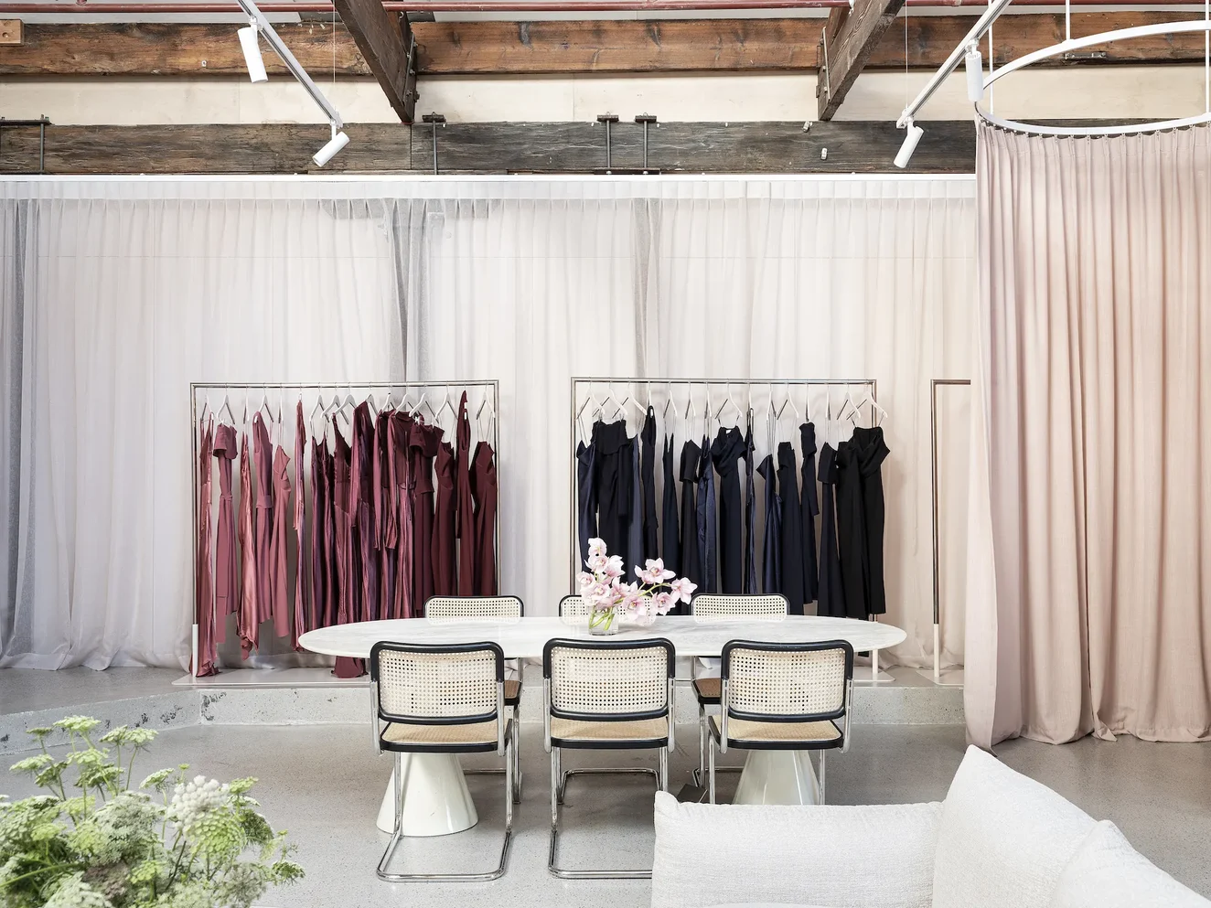 CHANGEROOM CURTAINS AT BEC + BRIDGE BOUTIQUE BY ZEPEL COLLECTION ATLAS COLOUR POWDER. Image credit: Bec + Bridge (website)