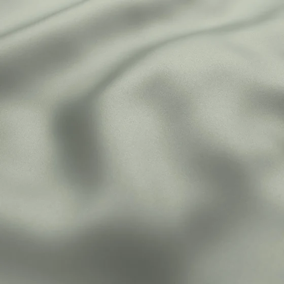 Photo of the fabric Sleek Mineral swatch by James Dunlop. Use for Curtains, Accessory, Top of Bed. Style of Plain, Taffeta