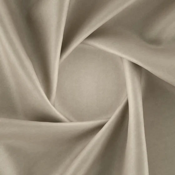 Photo of the fabric Speedo Dune swatch by Zepel. Use for Upholstery, Accessory, Top of Bed. Style of Plain, Suede